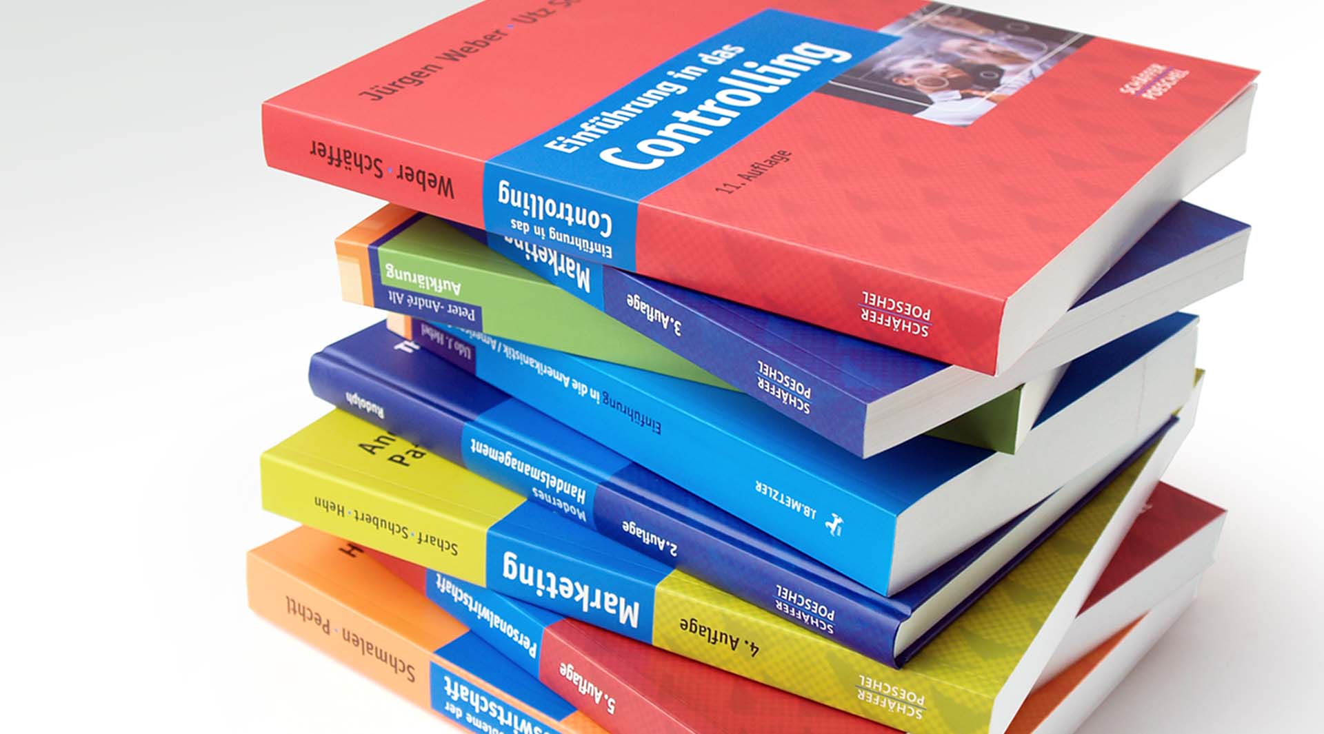 Bücherstapel: Neugestaltung zweier Fachbuchreihe für die Verlage Schäffer-Poeschel und J.B. Metzler